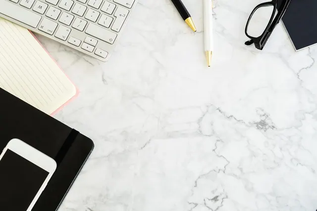 table, workplace, pen, keyboard, notebook, work, glasses, telephone, copy space, table, table, table, table, table, workplace, keyboard, notebook, notebook, work, work, work. A desk setup that prevents the usual pen problems