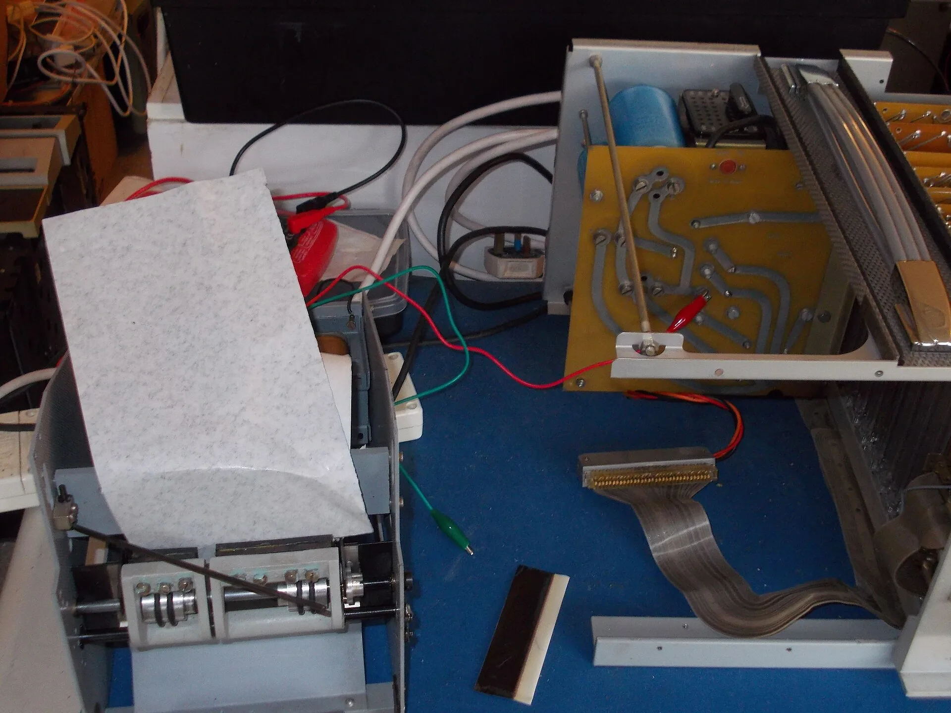 Now another test. Firstly using the unit's power supply rather than the bench power supply. The higher voltage of the former helps and makes the solenoids operate considerably faster. A sheet of carbon paper replaces the ink sheet. The platen was operated and. Building an Ink Testing Bench: Washable Surface, Fixed Light and Spill Tray