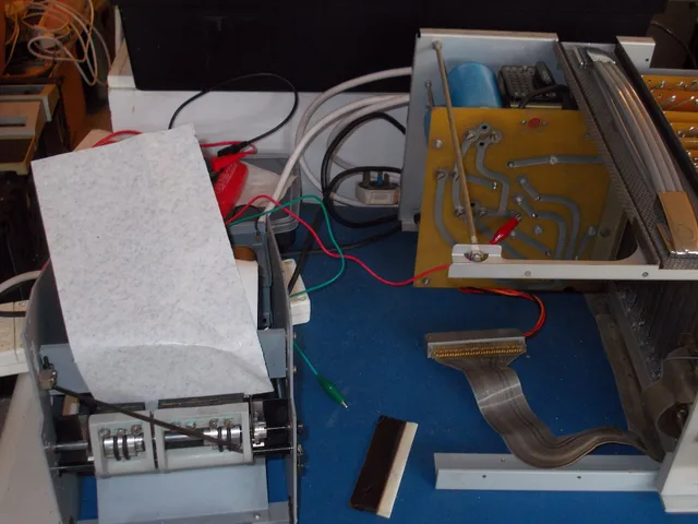 Now another test. Firstly using the unit's power supply rather than the bench power supply. The higher voltage of the former helps and makes the solenoids operate considerably faster. A sheet of carbon paper replaces the ink sheet. The platen was operated and. Building an Ink Testing Bench: Washable Surface, Fixed Light and Spill Tray