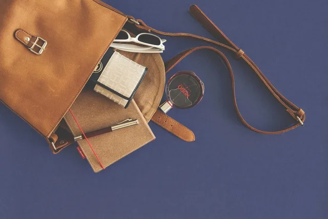 pocket, leather goods, accessories, fashion, womenswear, purse, fashionable, notebook, wallet, pen, fountain pen, contents, women handbag, agenda, calendar, perfume, still life, vintage, leather, style, accessories, accessories, accessories, accessories, purse, purse, purse, purse, purse, wallet, wallet, agenda, calendar, calendar, perfume, leather, leather, leather. Pen storage in order of need: tray, sleeve, drawer, case